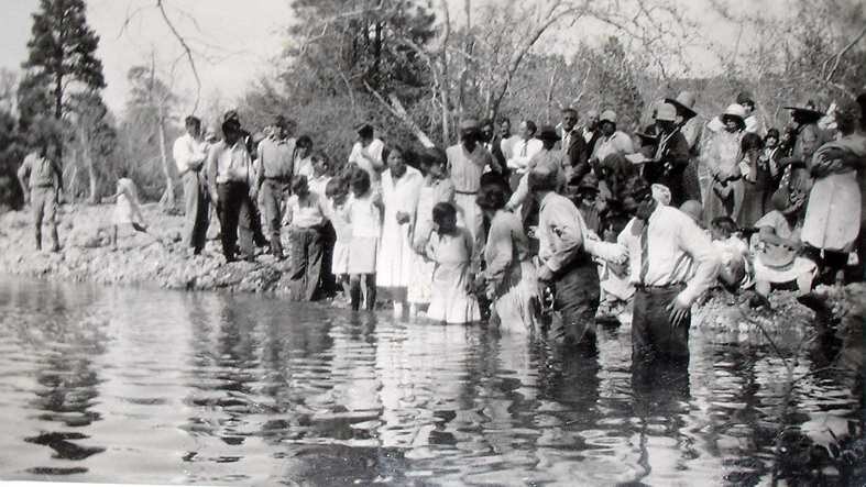 Historic outdoor baptism ceremony in Cherry Creek