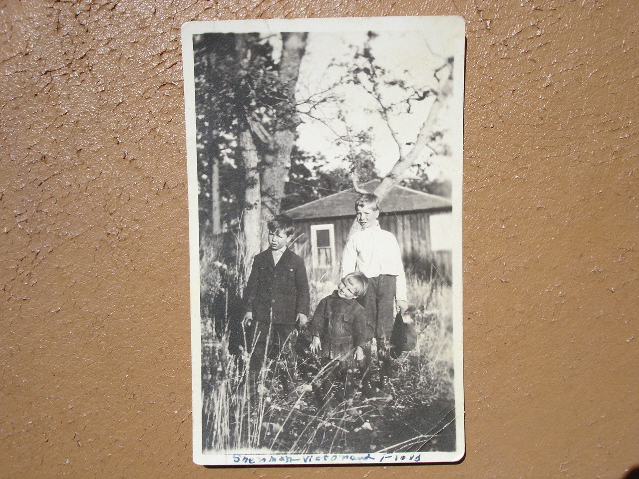 Brothers Sherman, Victor, and Floyd Waldrip as young boys in 1910s attire