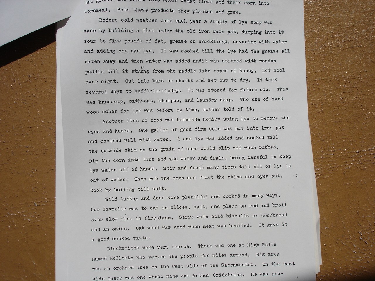 Typed memoir page describing making lye soap, hominy, and wild game cooking