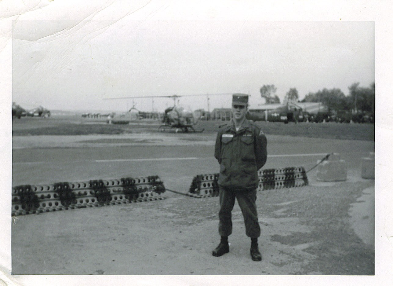 Marvin Waldrip and servicemen outdoors