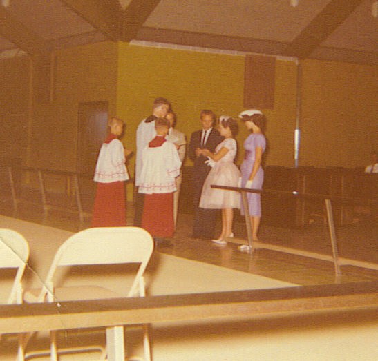 Marvin Waldrip and Ann Marie Watson at the altar during their wedding ceremony