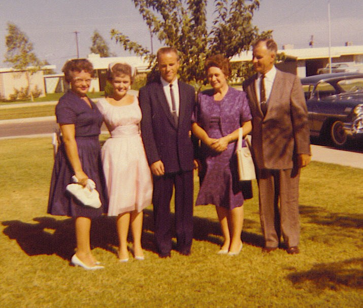 Marvin and Ann Waldrip with wedding guests outdoors